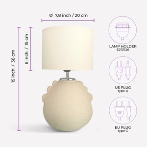 picture describes lamp measurements, total height 15 inches, width 7.8 inches, lamp shade alone measures 6 * 7.4 inches. it is a small sized lamp.