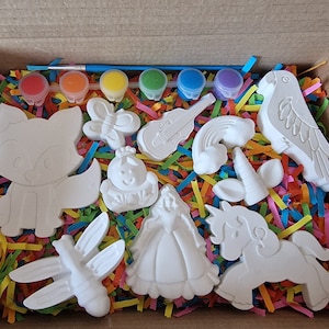 Girl's mystery box of 10 random shapes handmade from plaster of paris.