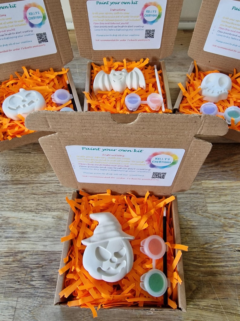 Paint you own Halloween shape with orange shredded protective paper, paint and brush