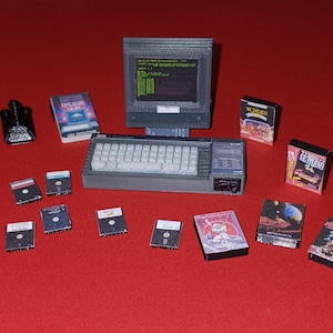 Amstrad cpc 6128 -Monitor - Disk 3" - Games Box - Joystick - Manual - Miniature - Souvenir