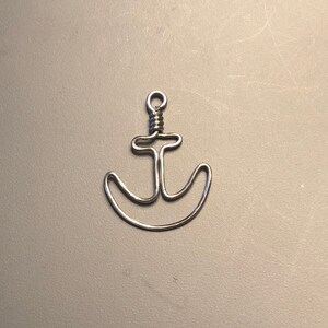 Anchor wire craft made from  metal wire. It can be used as ornament, necklace pedant, earring, key chain item, etc.