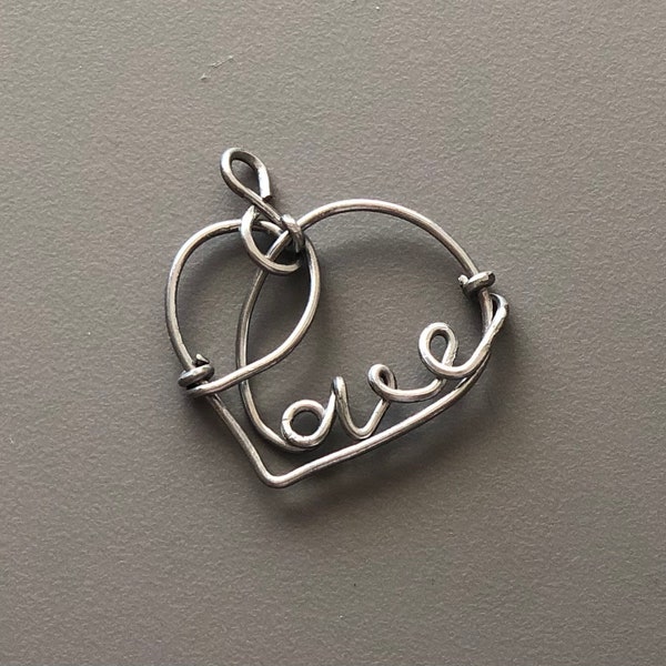 Heart Love craft made from galvanized steel wire. It can be used as ornament, necklace pedant, earring, key chain item, etc.