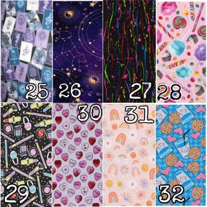 May include: A collection of fabric swatches with various patterns. Designs include tarot cards, constellations, colorful paint splatters, candy, makeup, conversation hearts, rainbows, and cookies with milk. Numbers 25-32 are printed on the swatches.