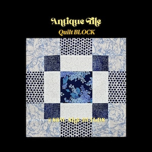 May include: A square quilt block with the text "Antique Tile Quilt BLOCK" in gold lettering. The block features a central square with a floral pattern, surrounded by squares with polka dots, floral, and marbled designs in shades of blue and white.