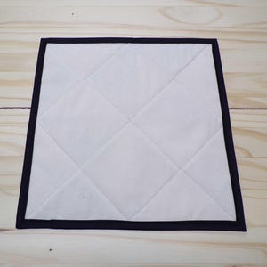Enchanted Swirl Quilted Table Topper NCU0NTV141