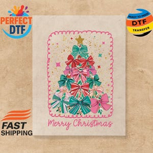 May include: A Christmas-themed DTF transfer featuring a tree made of bows in red, pink, and teal. The design includes a gold star and the words "Merry Christmas" in pink script. The image is framed with a pink border.