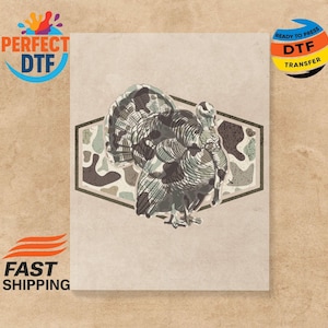 May include: A turkey illustration in shades of gray and brown, set within a geometric frame. The design is on a light beige background. The image includes the text "PERFECT DTF" and "READY TO PRESS DTF TRANSFER".