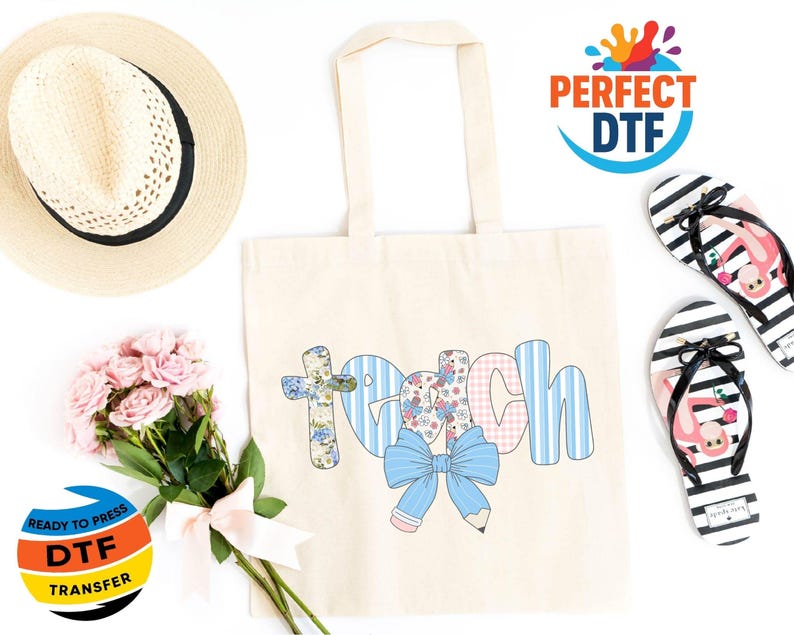 May include: Cream-colored tote bag with the word "Teach" in a colorful design, featuring a cross, bow, and pencil. Includes a straw hat, pink flowers, and black and white striped flip-flops with flamingo graphics.