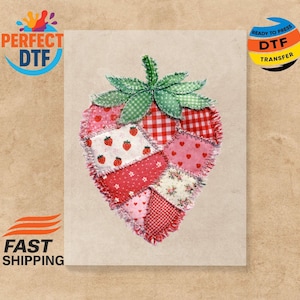 May include: A patchwork strawberry design with a green stem and leaves. The strawberry is composed of various red and pink fabric patches, including polka dots, gingham, and floral patterns. The image includes the text "PERFECT DTF" and "READY TO PRESS DTF TRANSFER".