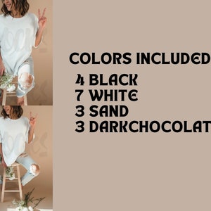 May include: A white t-shirt with a large, stylized design is worn with ripped blue jeans. The image includes the text "COLORS INCLUDED: 4 BLACK, 7 WHITE, 3 SAND, 3 DARKCHOCOLATE". The person is sitting on a wooden stool and holding flowers.