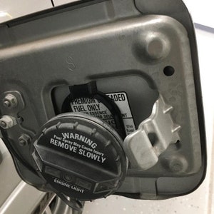 Gas / Fuel Cap Holder for Subaru Flap Door