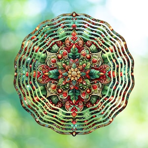 May include: A detailed, circular mandala design with a floral center, featuring red berries, green leaves, and a layered, wavy border. The artwork has a vibrant color palette and is set against a blurred green background.