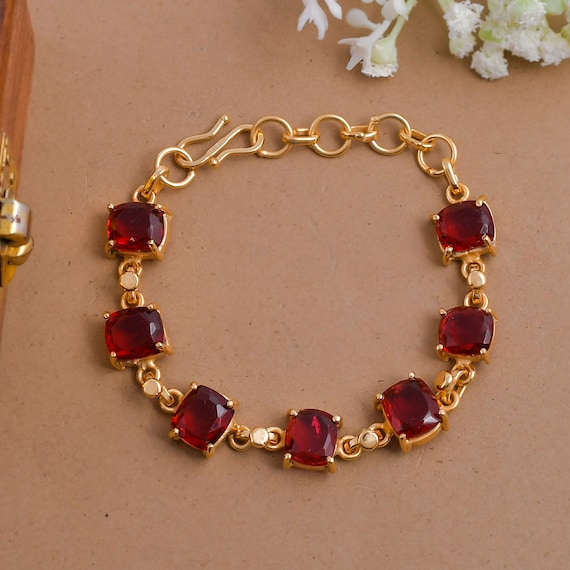 Cushion Gold Coated Brass Red Garnet Gemstone Bracelet, Style : Antique,  Gender : Female at Rs 300 / Piece in Jaipur