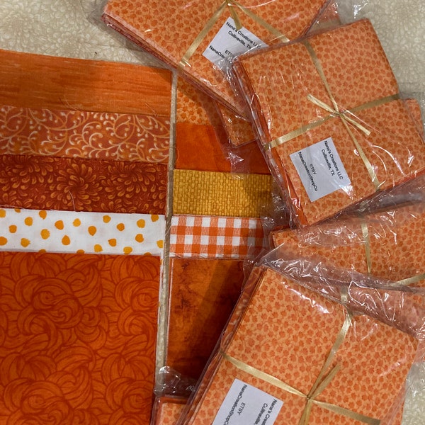 21-231 - New Packs - Orange Blends and White - 5 by 5 inch squares - Charm squares - 4 each of 10 fabrics per set - Total of 40