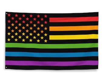 May include: A black flag with a rainbow-colored design. The flag features a field of yellow stars in the upper left corner, with rainbow stripes and a black background. The flag is rectangular and has grommets in the corners.