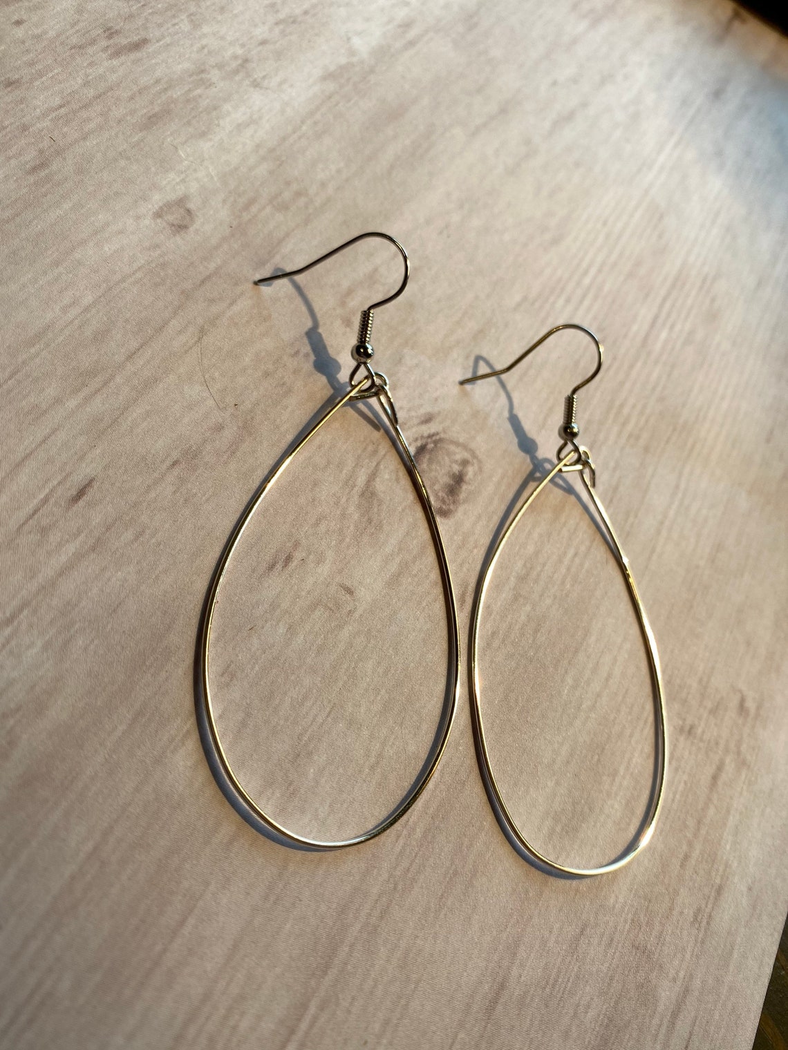 Gold oval wire hoops Etsy