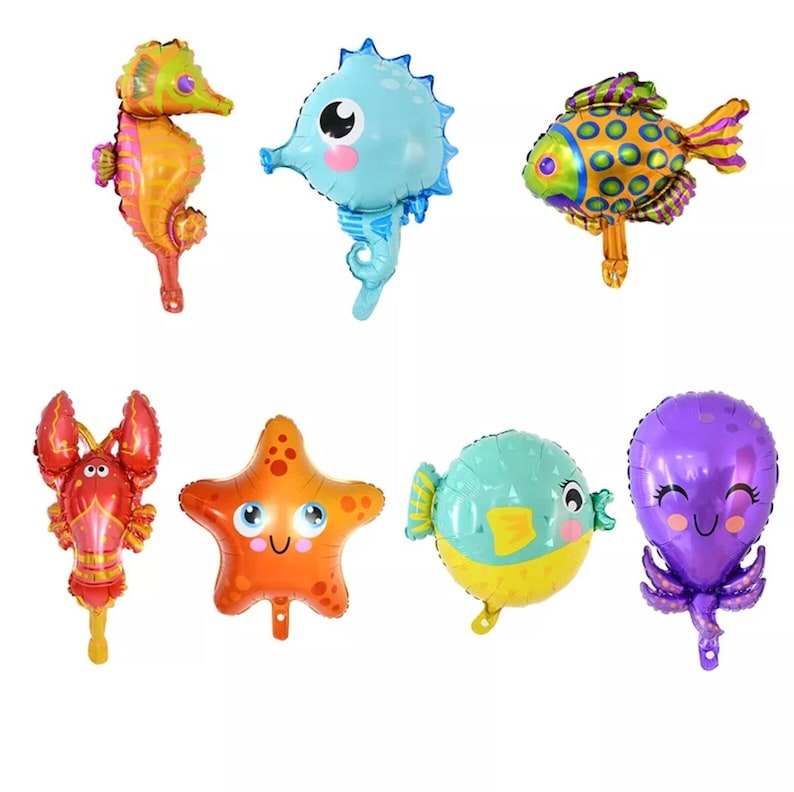 May include: Set of eight colorful foil balloons featuring sea creatures. The balloons include a seahorse, a starfish, a crab, a pufferfish, an octopus, and two different fish. The balloons are all inflated and ready to be used for a party or celebration.