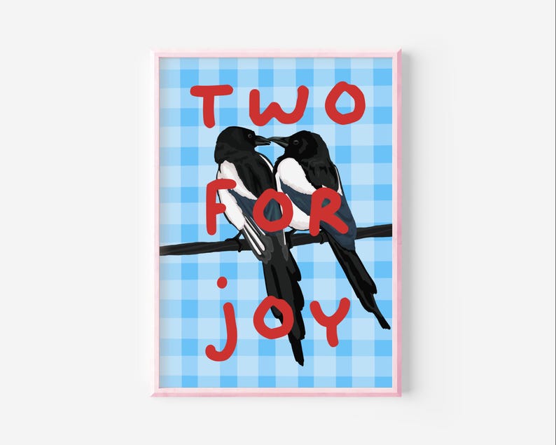 May include: Two magpies perched on a branch against a blue and white gingham background. The text "TWO FOR JOY" is written in red.