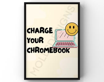 May include: A black framed poster with a yellow smiley face and a laptop with the text "CHARGE YOUR CHROMEBOOK" on a light yellow background.