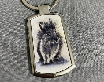 Boxed metal keyring, featuring my Lionhead ink drawing