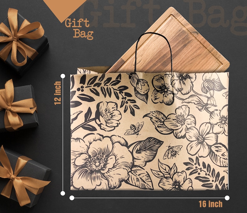 May include: A kraft paper gift bag with a floral and bee pattern, measuring 16 inches wide and 12 inches high. A wooden cutting board is inside the bag. The words "Gift Bag" are at the top. Black gift boxes with gold ribbons are in the background.