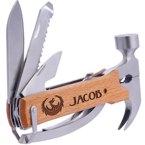 May include: A multi-tool with a wooden handle and a hammer head. The handle is engraved with the name "JACOB" and a dragon design. The tool has a variety of blades and other tools, including a saw, a screwdriver, and a bottle opener.