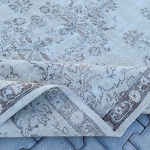 Handmade Beige Turkish Wool Rug 6x9: Muted Oriental Design