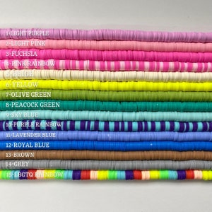 May include: A close-up of 15 rows of colorful polymer clay beads. The beads are arranged in rows, with each row representing a different color. The colors are: light purple, light pink, fuchsia, pink rainbow, beige, yellow, olive green, peacock green, sky blue, purple rainbow, lavender blue, royal blue, brown, grey, and LGBTQ rainbow.