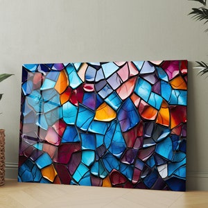 May include: Abstract art print featuring a colorful mosaic of blue, purple, red, orange, and yellow glass pieces.