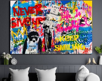 May include: A colorful abstract art print with the words "Never Give Up", "Love is the Answer", "Life is Beautiful", and "Keep Smiling". The print features a monkey wearing a shirt that says "Keep it Real" and a person holding a sign that says "Love is the Answer".