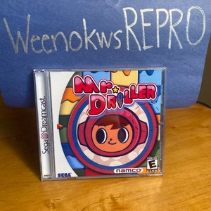 May include: A Sega Dreamcast game case with a colorful image of Mr. Driller on the front. The game is rated E for Everyone by the ESRB. The case is in good condition.