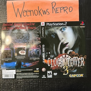Op de afbeelding: PlayStation 2 game case voor "Clock Tower 3". De cover toont een vrouw met blauwe ogen en de titel van de game. De case is zwart met het PlayStation 2 logo.