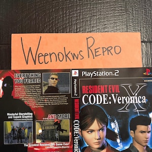 May include: A PlayStation 2 video game cover for Resident Evil Code: Veronica X. The front features two characters, while the back displays game screenshots, text descriptions, and a Mature M rating. A handwritten orange note reads Weenokws Repro.