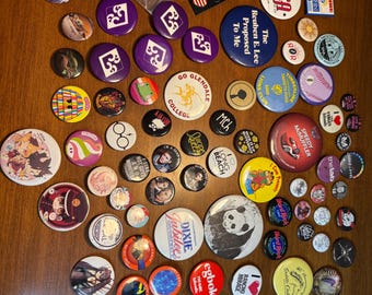 Lot of 78 button pins & a pair of earrings