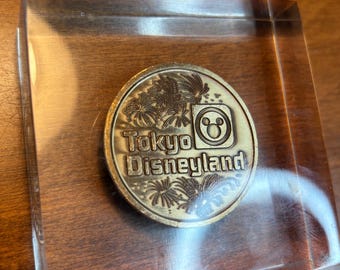 Tokyo Disneyland Ground Purification Ceremony Coin (12/3/1980) in Lucite