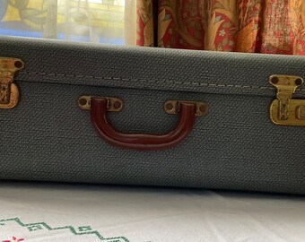 Vintage, Small Suitcase with brown handle and Trim.