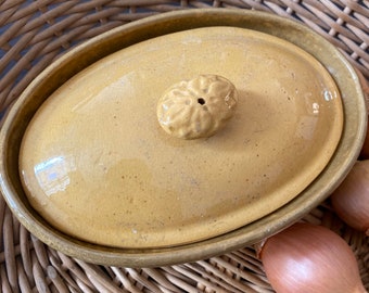 Old foie gras terrine in glazed terracotta and its vintage French lid