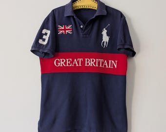 トップス 1990's Polo by Ralph Lauren polo shirt SALE - Vintage 1990s Black Ralph Lauren Polo Lion Crest Rugby
