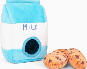 May include: A blue plush milk carton with a hole in the front and three brown plush cookies. The milk carton has the word "MILK" printed on the front.
