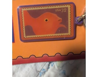 Vintage US Postal Bright Eyes 32 Cent Stamp Brass Enamel Keychain NIP