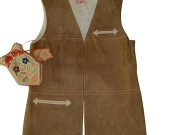 May include: A brown suede vest with white arrow accents and a matching small bag with floral embroidery. The vest has a V-neck and a light-colored lining. The bag is beige with colorful floral designs.