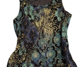 May include: Sleeveless top with a black, teal, and blue floral pattern. The fabric has a textured appearance with gold accents. The top has a scoop neckline and a slightly flared hemline.