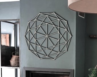 Arte murale in metallo con geometria sacra: scultura geometrica moderna