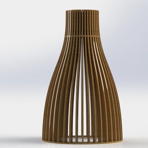 May include: A brown vase constructed from vertical wooden slats arranged in a circular, tapered silhouette. The structure features a narrow neck that widens toward the base, creating an open, slatted design that reveals the hollow interior space.