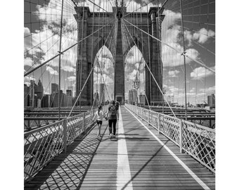 On the Brooklyn Bridge looking toward Manhattan and New York Financial District - B&W