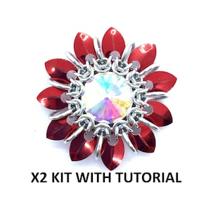 May include: A red and silver flower-shaped jewelry piece with a crystal center. The piece is labeled "X2 KIT WITH TUTORIAL".