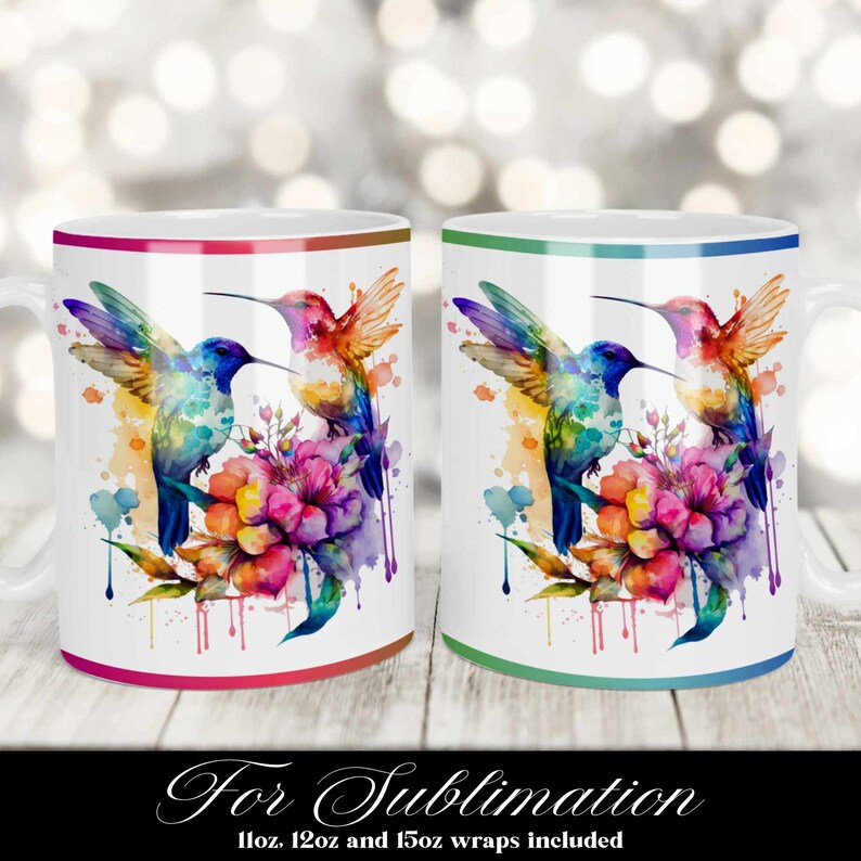 May include: Two white ceramic mugs with a colorful watercolor design of two hummingbirds and a flower. The mugs have a red and green rim.
