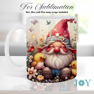 May include: A white ceramic mug with a colorful design featuring a smiling gnome surrounded by flowers, butterflies, and birds. The gnome is wearing a red hat and blue pants. The mug has the text "JOY" on the bottom.