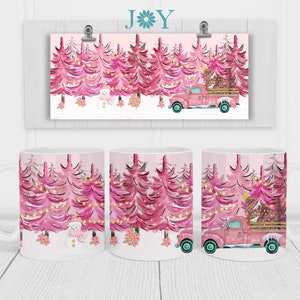 May include: A white ceramic mug with a pink and white Christmas tree design. The mug features a pink truck carrying a Christmas tree and a snowman in the snow.