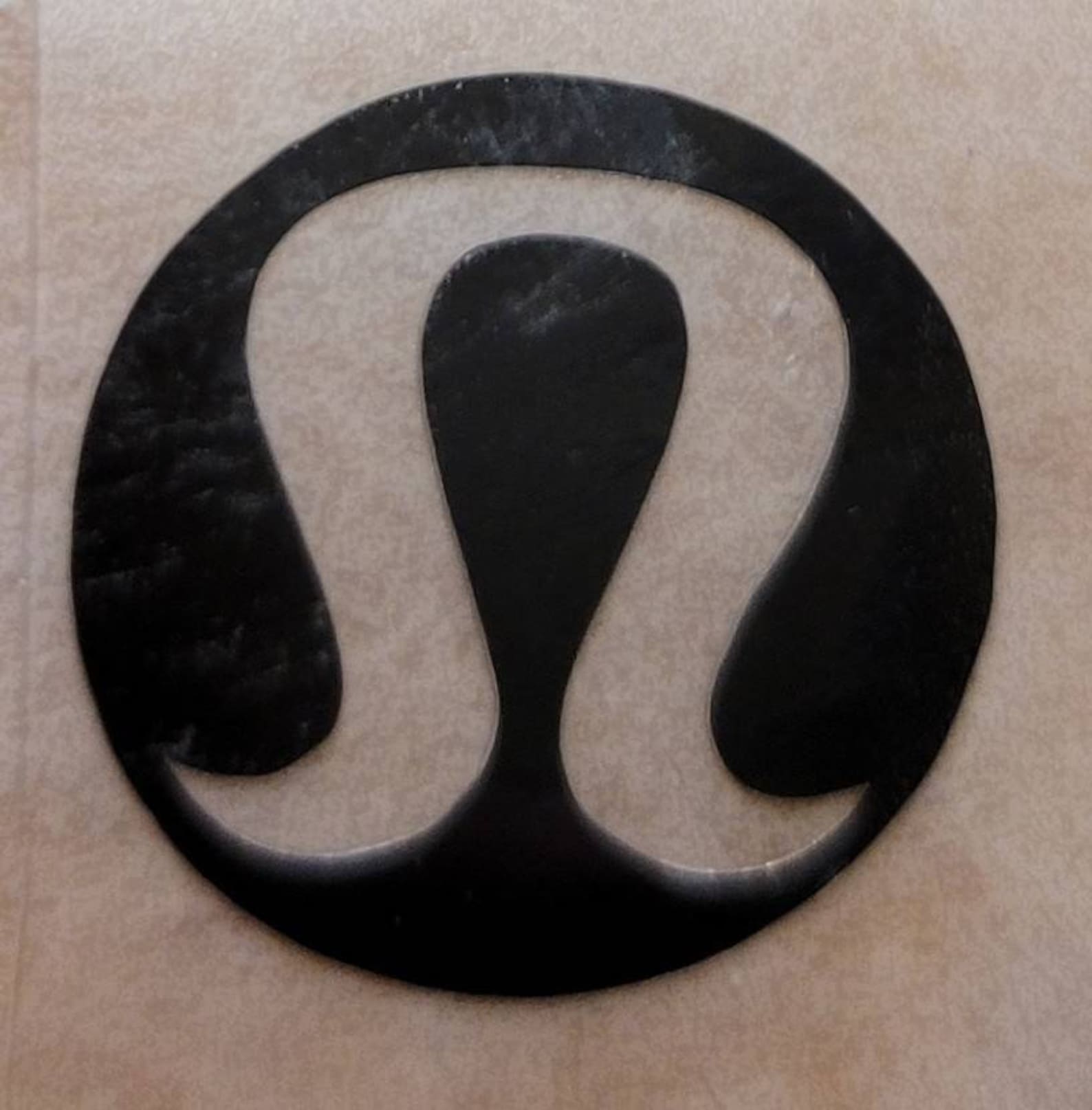 lululemon symbol iron on veneering